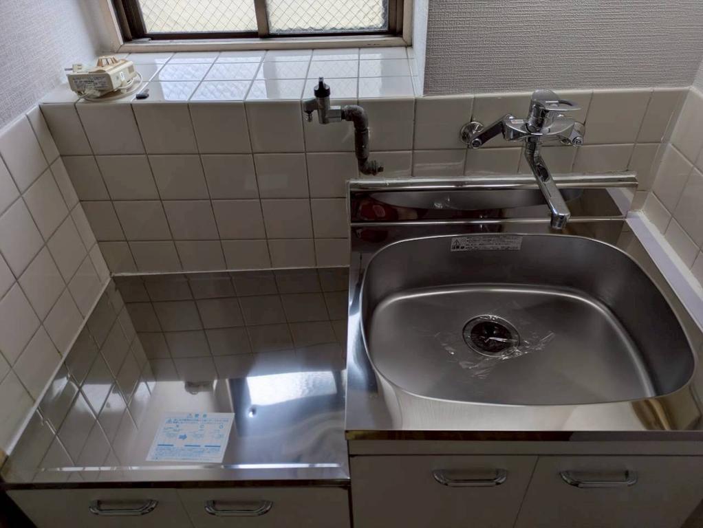 Well-Kept 2-Bedroom Condo in Niitaka 1